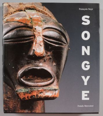 une image représentant un livre sur lequel figure le dessin d'un visage