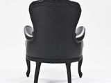 an image of a black leather chair on a white background