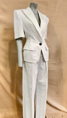 an image of a mannequin wearing a white suit
