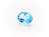 a blue topaze gems on a white background