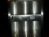 a machine that is sitting on a table in the dark