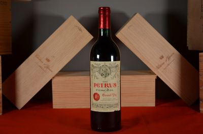 a bottle of wine that is sitting on a table