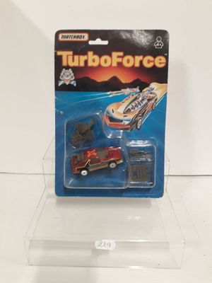 a close up of a toy car on a clear shelf