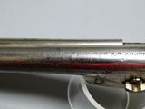 a gun that is sitting on top of a table