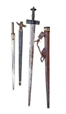 three different types of knives on display on a white background