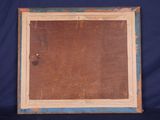 an old picture frame with a blue background and a brown background