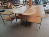 a wooden table with two benches in the middle of the room