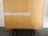 an image of a piece of furniture that has been taped up