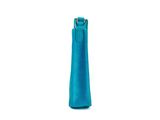 the small blue bag is sitting on a white surface