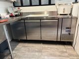 a stainless steel counter in a commercial kitchen