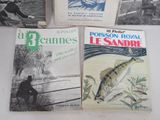 three books are sitting on a table next to each other