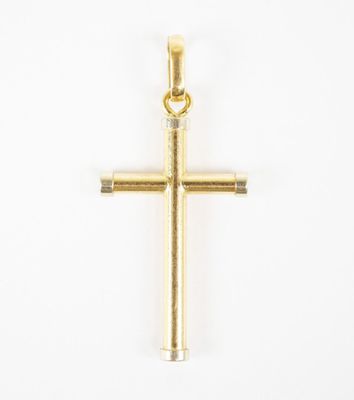 a gold cross pendant on a white background