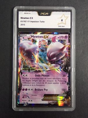 a close up of a pokemon card on a table
