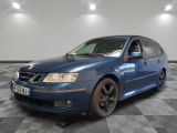 a picture of a blue car on a checkered floor