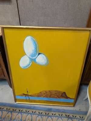 painting of three eggs on a yellow background in a gold frame