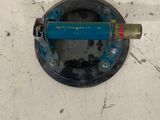 an image of a blue and yellow device on a white surface