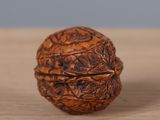 a wooden object that is sitting on a table
