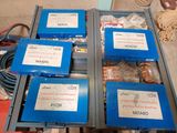 four blue boxes with labels are stacked on top of each other
