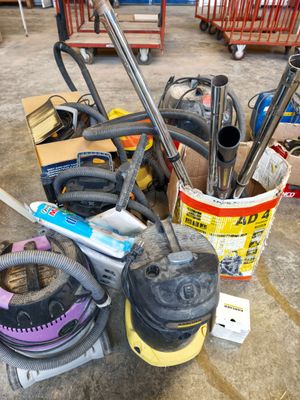 many different types of vacuums and other tools on the floor