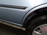 a close up of a car that has a denting on it