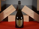 a bottle of wine that is sitting on a table