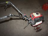 a close up of a small engine on the ground