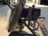 a small machine that is sitting in the garage