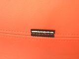 an image of a close up of a purse with a label on it