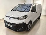 a picture of a white van parked in a building
