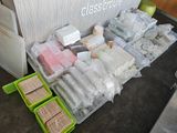 a table with a lot of food and containers on it