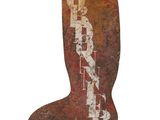 a rusted boot shaped object on a white background