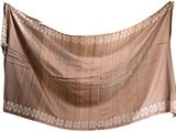 an image of a brown scarf hanging on a clothes line