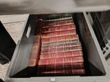 a lot of books that are sitting in a box