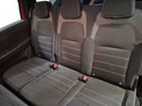 four seats in the back of a car that are empty