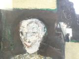 a painting of a woman in a green dress on the wall