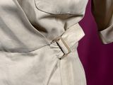 a close up of a woman ' s dress with a belt