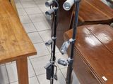 two microphones that are on a stand in a room