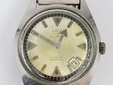 an image of a silver watch with roman numerals on the face