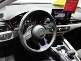 steering wheel and dashboard of a car on display in a showroom