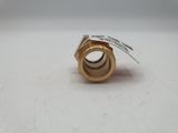 a small gold ring with a tag on it