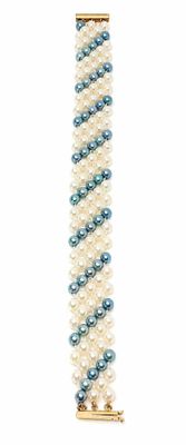 a close up of a white and blue bracelet on a white background