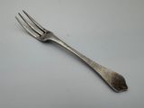 a fork that is sitting on a table