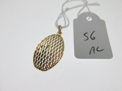 a close up of a gold necklace with a price tag on it