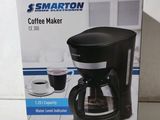 une boîte contenant une cafetière