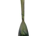 a glass vase with a green and black design on it