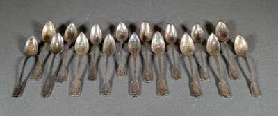 a lot of spoons that are sitting on a table