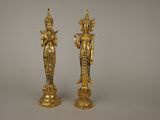 paire de figurines anciennes en laiton représentant une femme et un homme