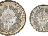 two silver coins, one of which is the same size as the other