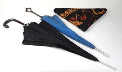 two umbrellas that are sitting next to each other on a table