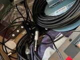 a bunch of cables and wires that are on the floor
